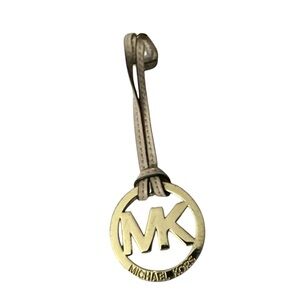 Micheal kors gold with tan leather purse charm brand new nice